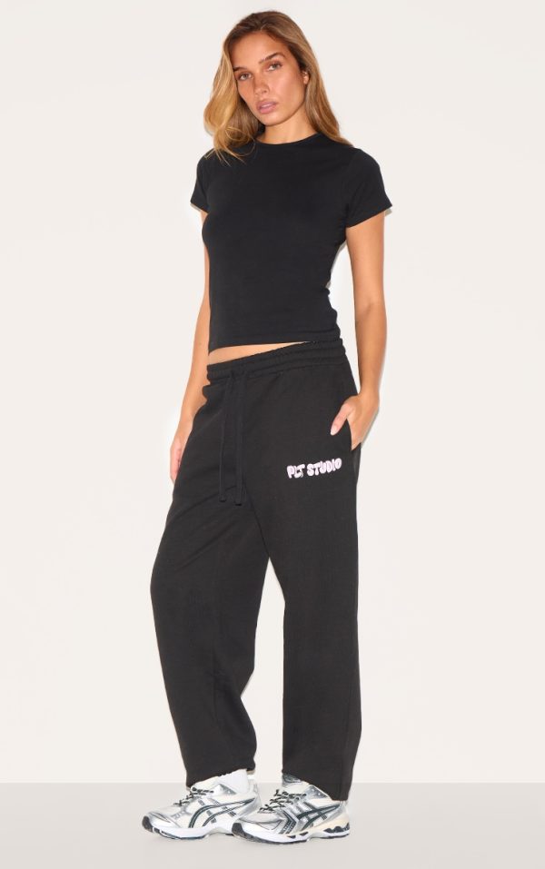 PRETTYLITTLETHING Black Premium Studio Print Cuffed Sweatpants