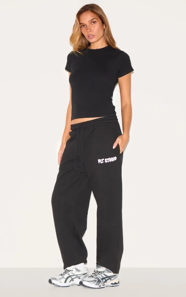 PRETTYLITTLETHING Black Premium Studio Print Cuffed Sweatpants