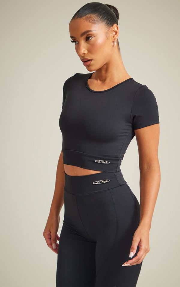 PRETTYLITTLETHING Black Sport Metal Badge Sculpt Short Sleeve Crop Top
