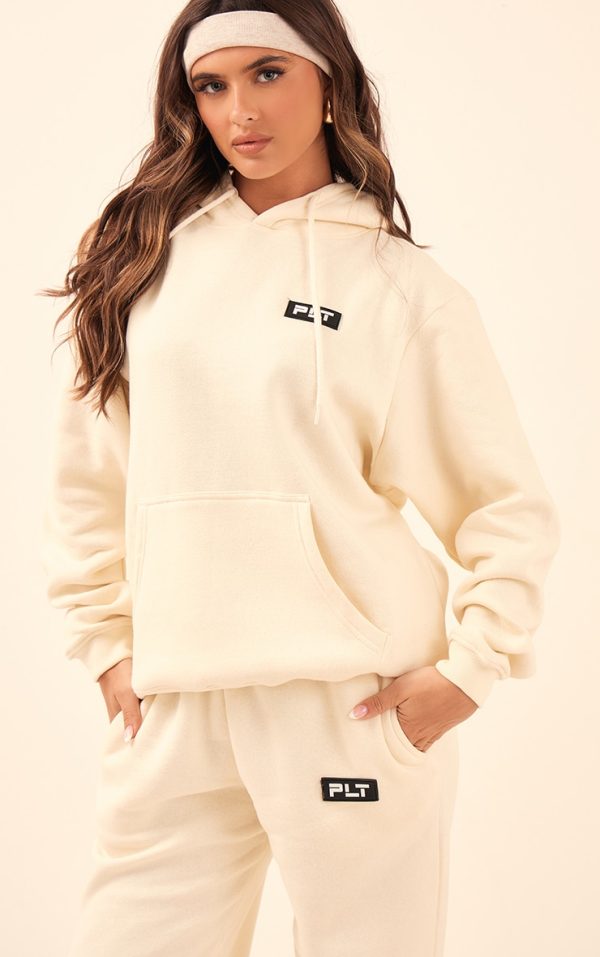 PRETTYLITTLETHING Cream Logo Badge Detail Oversized Hoodie