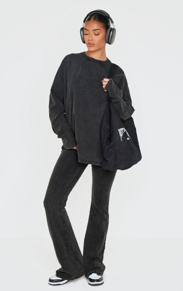PRETTYLITTLETHING Black Embossed Logo Washed Skinny Flare Pants