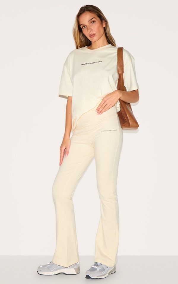 PRETTYLITTLETHING Beige Printed Flared Pants