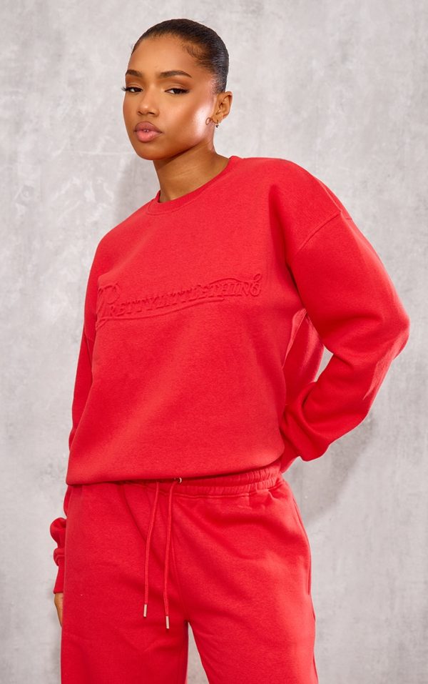 PRETTYLITTLETHING Red Embossed Graphic Oversized Sweatshirt