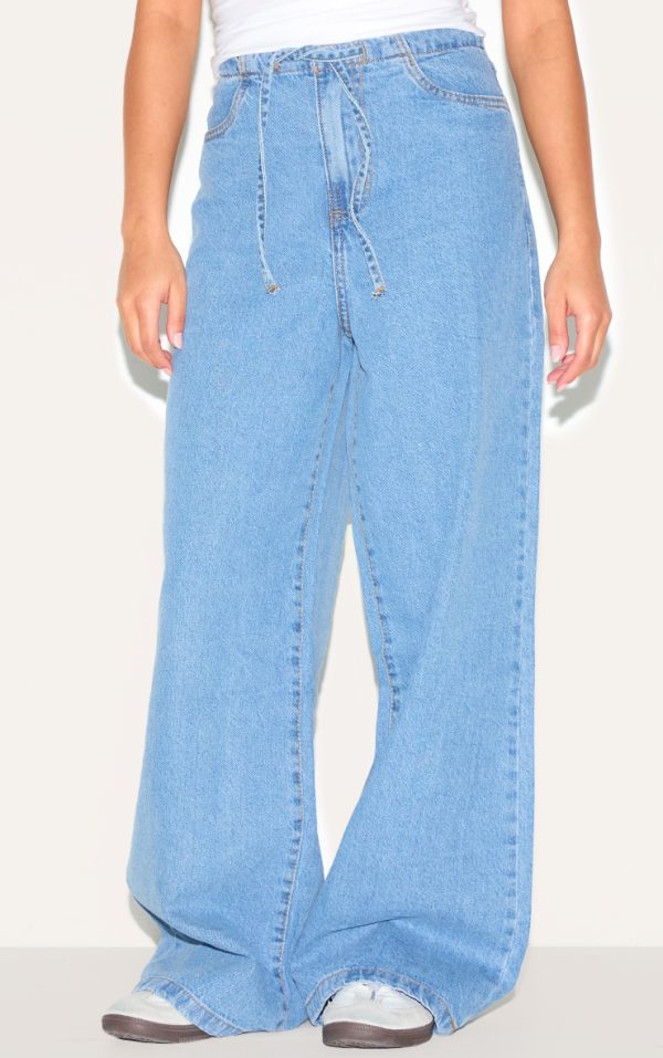 Petite Mid Blue Wash Low Rise Tie Waistband Wide Leg Jeans
