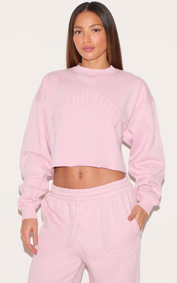 PRETTYLITTLETHING Tall Washed Pink Distressed Varsity Cropped Sweatshirt
