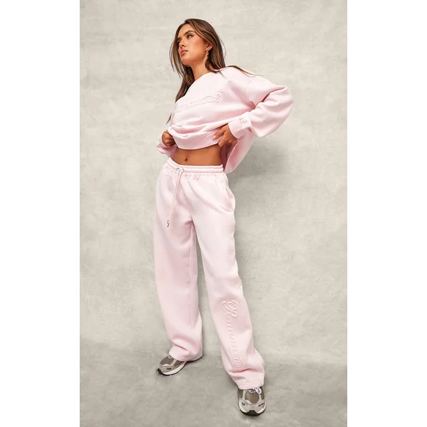 PRETTYLITTLETHING Baby Pink Embossed Graphic Straight Leg Sweatpant