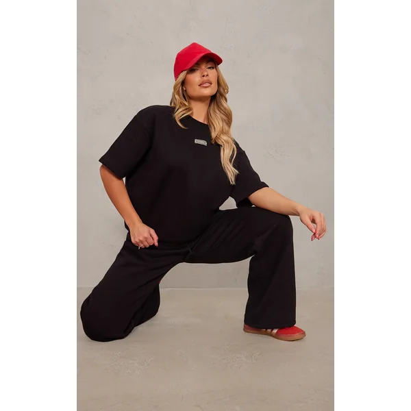 PRETTYLITTLETHING Black Badge Detail Oversized Short Sleeve Sweatshirt