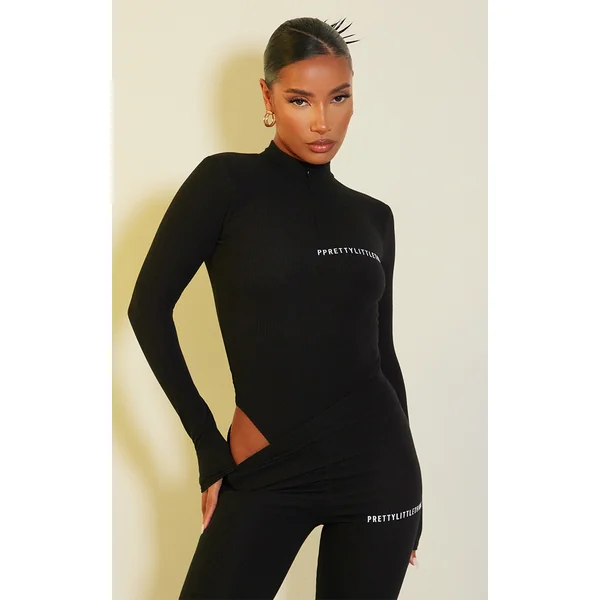 PRETTYLITTLETHING Black Crinkle Rib Half Zip Bodysuit
