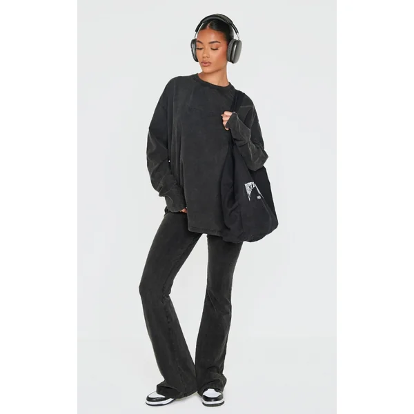 PRETTYLITTLETHING Black Embossed Logo Washed Skinny Flare Pants