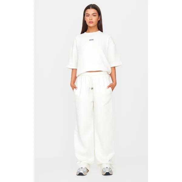 PRETTYLITTLETHING Cream Badge Detail Mid Rise Wide Leg Sweatpants