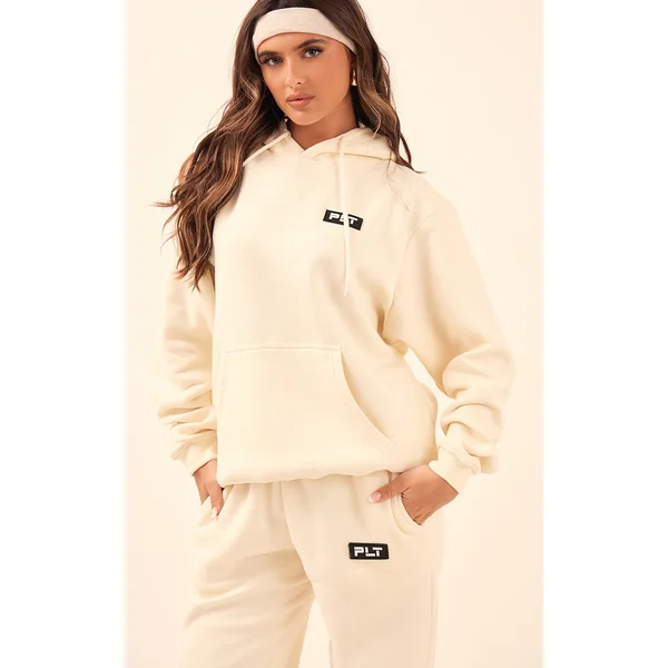 PRETTYLITTLETHING Cream Logo Badge Detail Oversized Hoodie