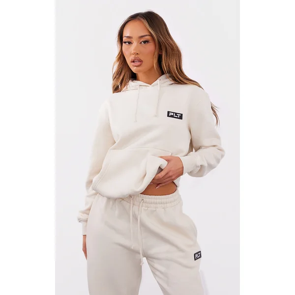 PRETTYLITTLETHING Petite Cream Badge Detail Oversize Hoodie