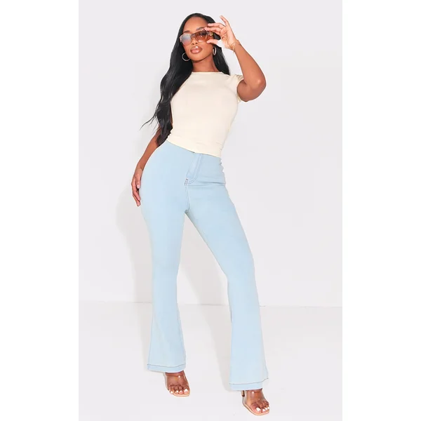 PRETTYLITTLETHING Shape Light Blue Wash Split Hem Detail Flared Jeans