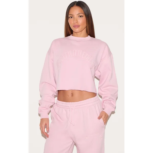 PRETTYLITTLETHING Tall Washed Pink Distressed Varsity Cropped Sweatshirt